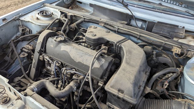 1988 Plymouth Horizon America engine bay