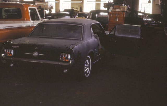 1966 Ford Mustang rear in dealership shop