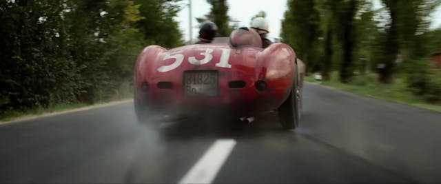 Ferrari film racing action still rear
