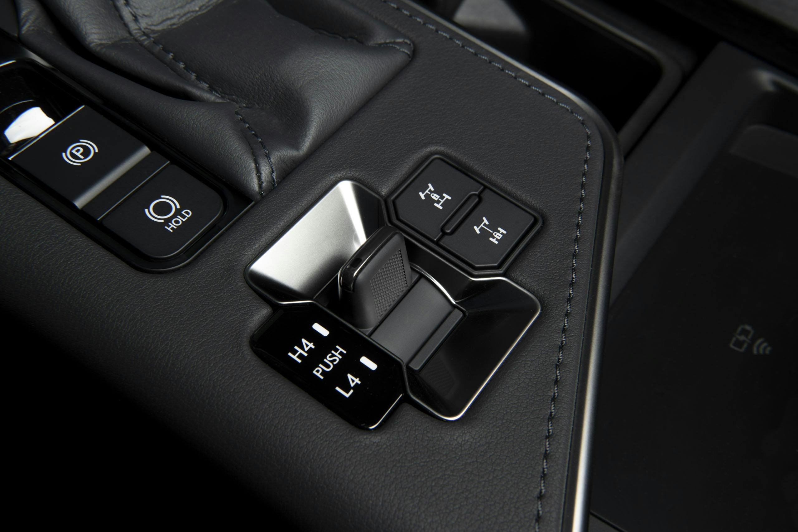 2024 Lexus GX 550 Overtrail+ interior transfer case and diff locker controls detail