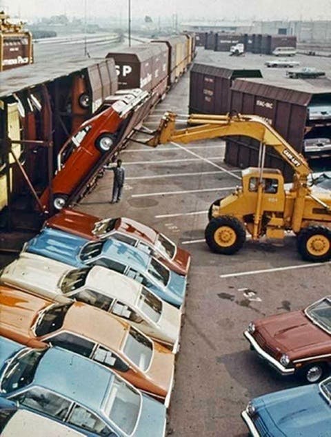 1971 Chevrolet Vegas being loaded onto a Vert-a-Pac