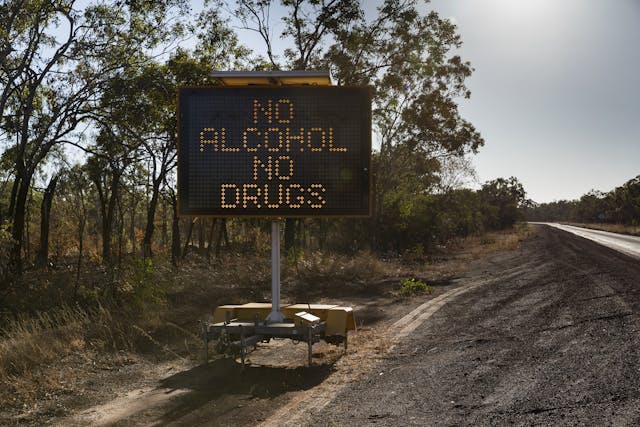No Alcohol No Drugs digital road sign at sunny roadside