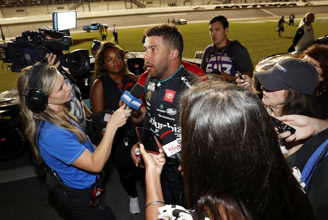 Bubba Wallace talking with reporters Daytona International Speedway 2023