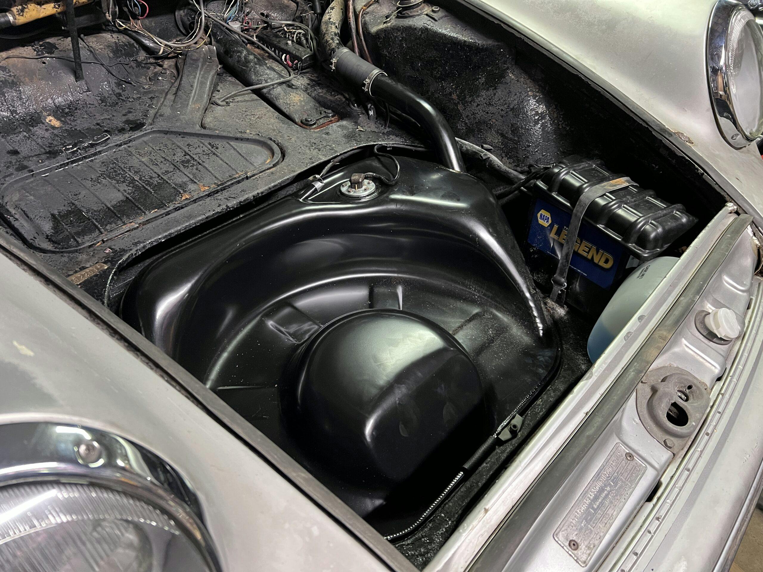 Porsche 912 project car frunk spare tire compartment