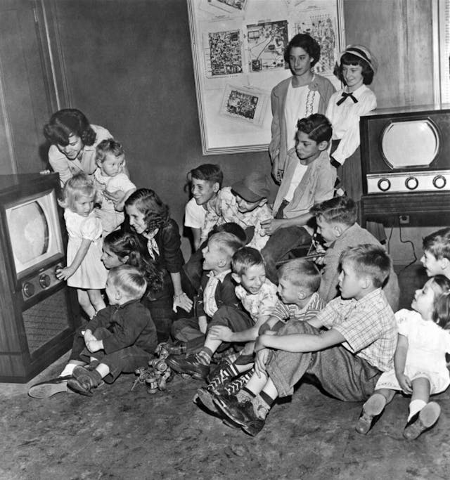 Kids At A Muntz TV Showroom