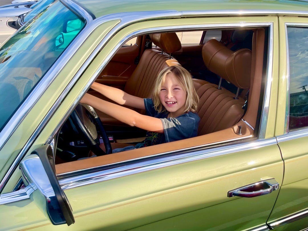 1979 mercedes-benz 300SD kid in front seat