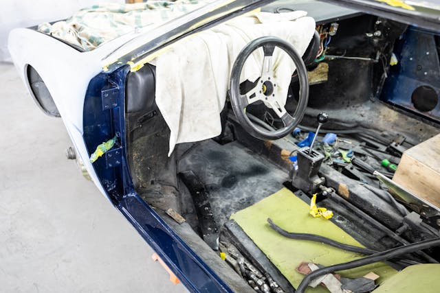 1975 Dino 308 GT4 restoration larry webster project car paint sills interior