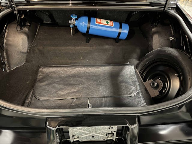 1986 Chevrolet Monte Carlo SS Lingenfelter Auction POTW trunk with NOS bottle