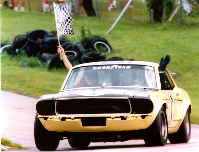 Phil Jacobs Shelby Mustang trans am race checkered flag win