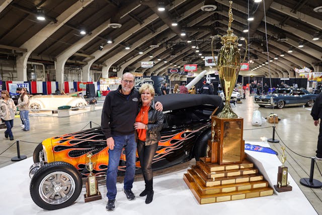 Roy Brizio and Beth Meyers with the 2024 AMBR winning 1932 Ford Phaeton
