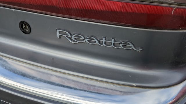 1989 Buick Reatta rear lettering badge