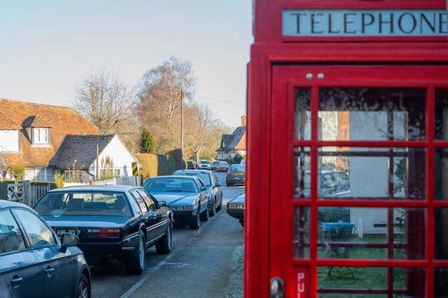 Aston Martin Lagonda group UK red phone booth