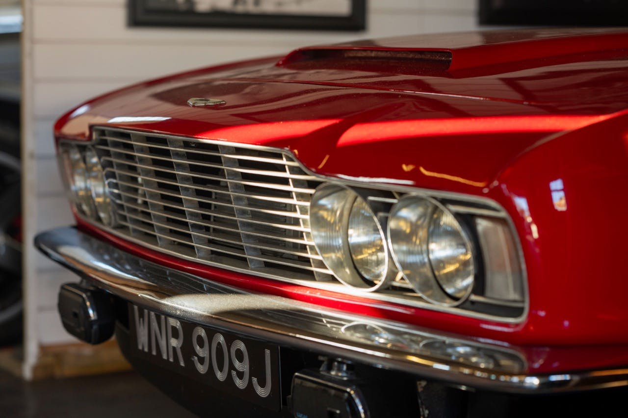 Aston Martin vintage car front end red