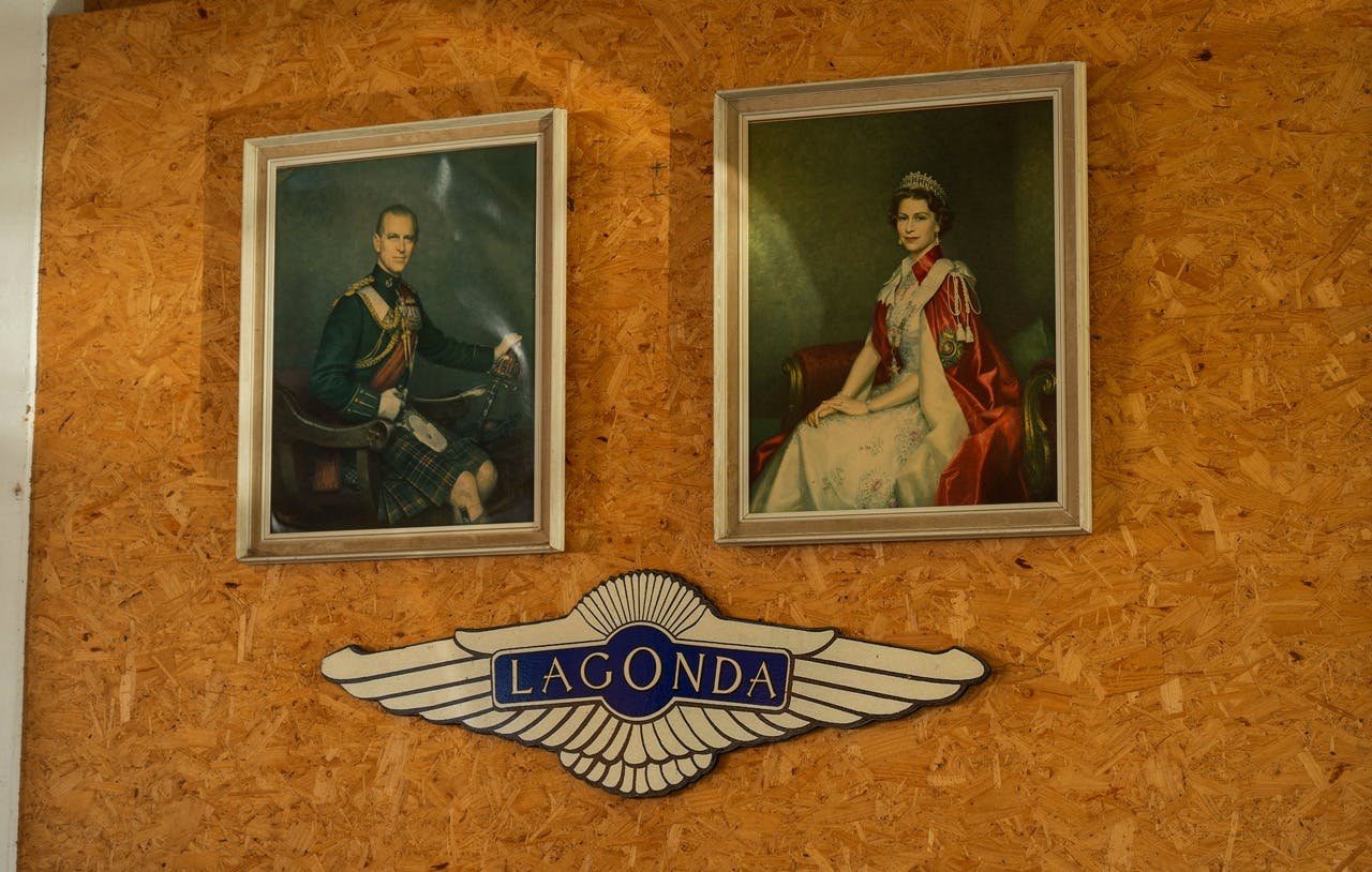 Aston Martin Lagonda shrine wall of items