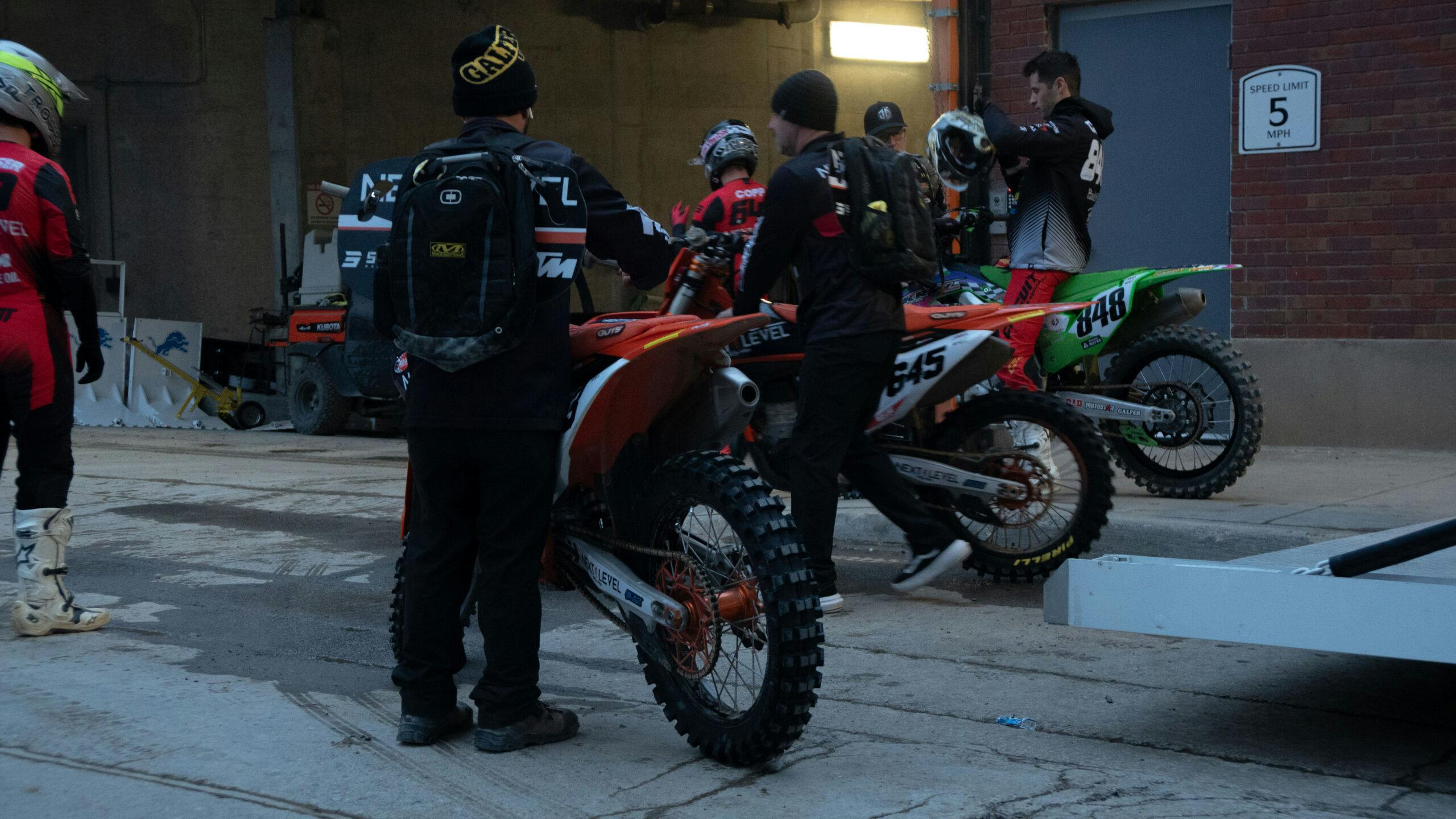 Supercross bikes waiting to enter Ford field