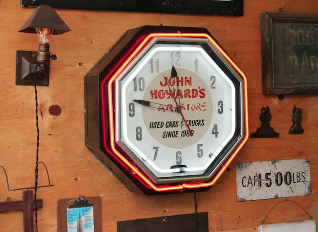 John Howards Car tore dealership vintage neon sign clock