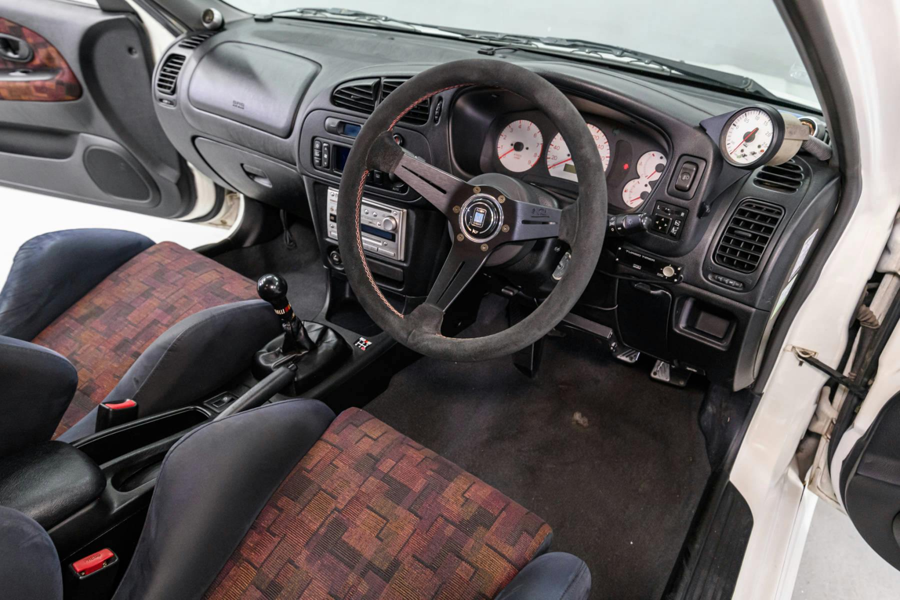 1997 Mitsubishi Lancer Evolution IV GSR cockpit steering wheel