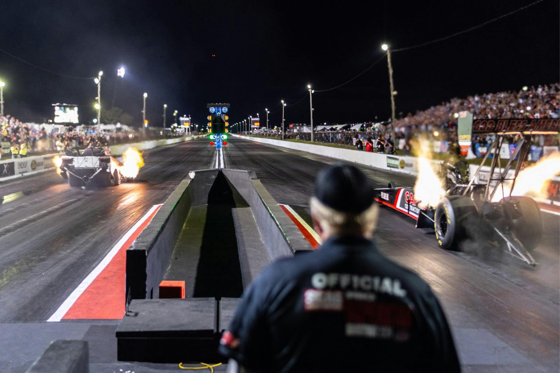 Chad Green (left lane) vs. Steve Torrence in the Top Fuel vs. Funny Car Shootout final round