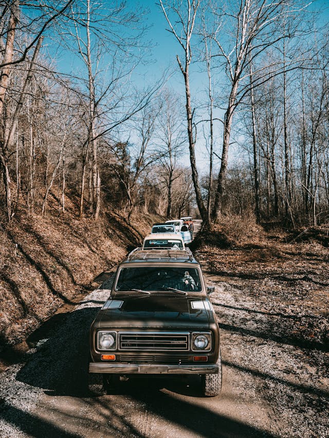 Scout Rally vintage SUV muddy trails vertical