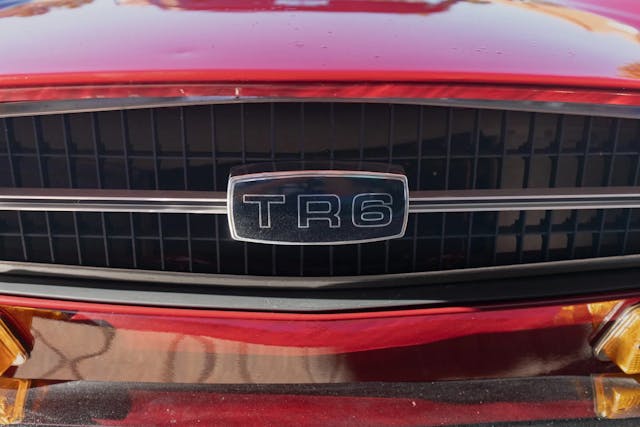 1972 Triumph TR6 badge close up