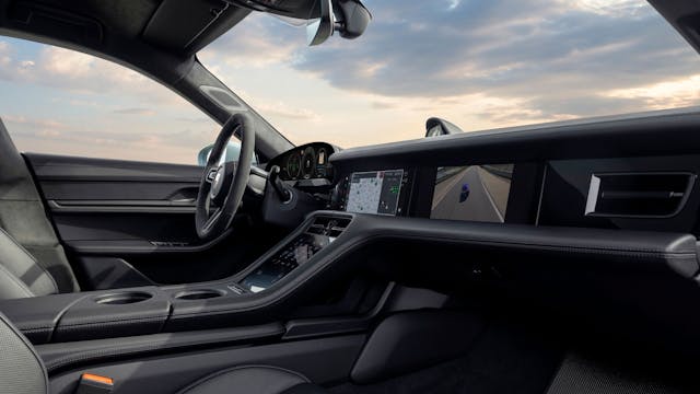 2025 Porsche Taycan Turbo GT interior dashboard area through passenger's door