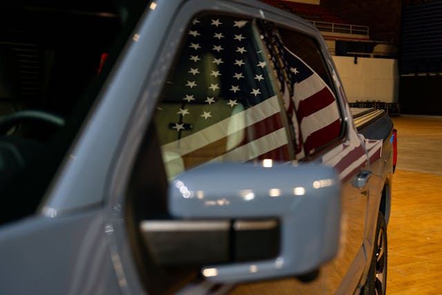 EPA Finalizes Auto-Emissions Rules To Propel EV Sales US flag reflection