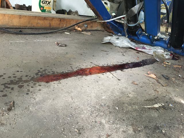 DIY exhaust repair fluid leak on garage floor