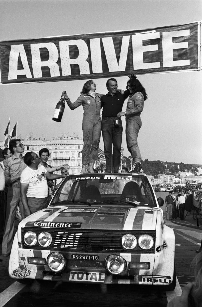 Mouton and Conconi celebrate victory in the 1978 Tour de France atop their Fiat 131