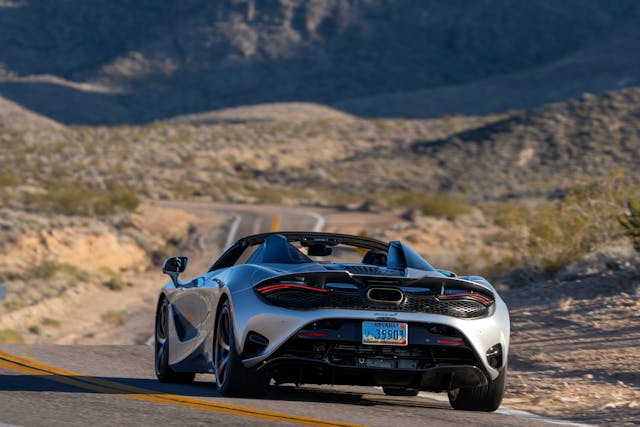 2024 McLaren 750S rear three quarter road driving action