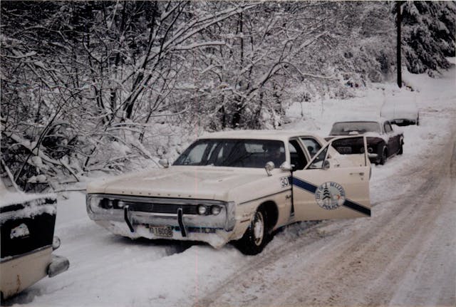 1971 Plymouth Fury Police Cruiser stuck in snow