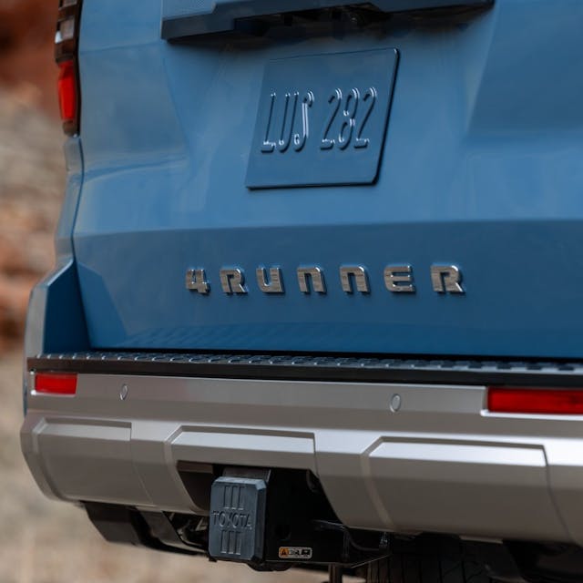 Sixth-gen Toyota 4Runner teaser photo exterior rear tailgate detail blue