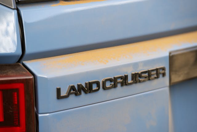 2024 Toyota Land Cruiser Heritage Blue badge dust detail