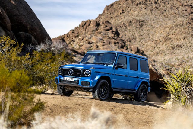 2025 Mercedes-Benz G 580 with EQ Technology exterior front three quarter blue in desert