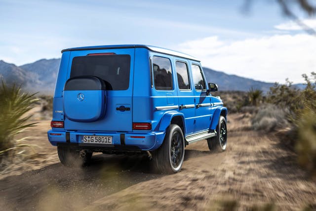 2025 Mercedes-Benz G 580 with EQ Technology exterior rear three quarter blue in desert