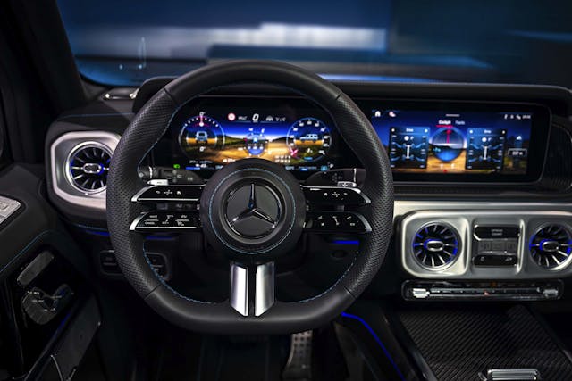 2025 Mercedes-Benz G 580 with EQ Technology interior wheel and instrument panel at night