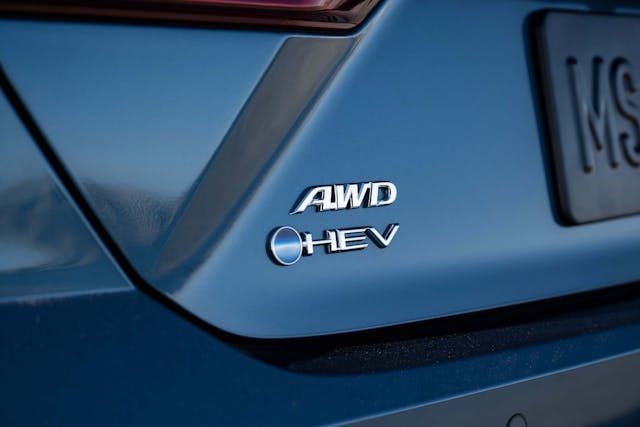 2025 Toyota Camry XLE AWD exterior AWD HEV trunk badge details
