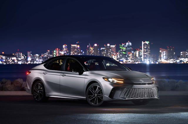 2025 Toyota Camry XSE exterior front three quarter night by water gray