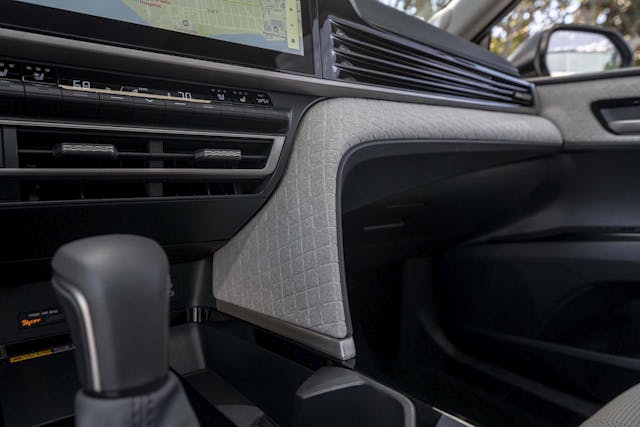 2025 Toyota Camry XLE interior textured fabric detail in passenger area