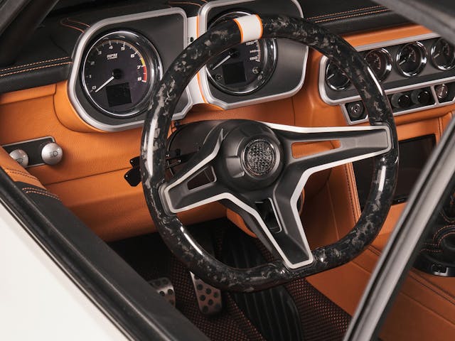 Ringbrothers 1969 Camaro Strode interior upholstery leather carbon crushed steering wheel