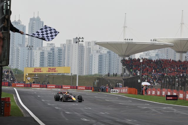 Max Verstappen takes the chequered flag during the F1 Grand Prix of China on April 21, 2024