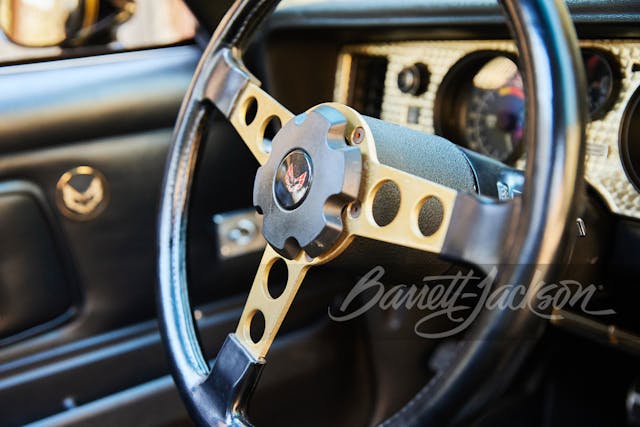 Burt-Reynolds-1977-Pontiac-Firebird-Trans-Am-steering wheel closeup