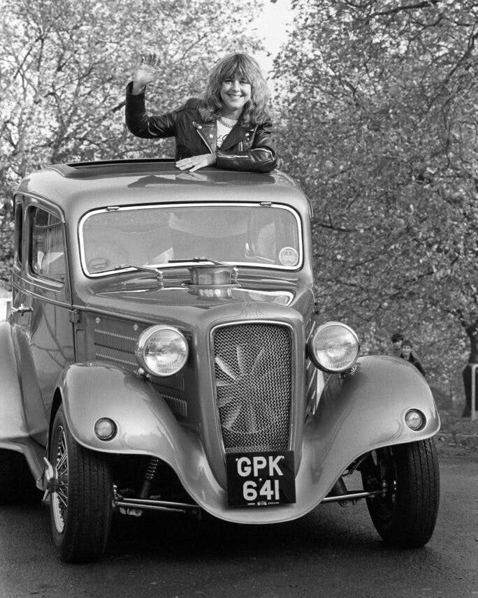 America's Queen of Rock, Suzi Quatro gets a roof view from a 1938 Austin 7 Ruby