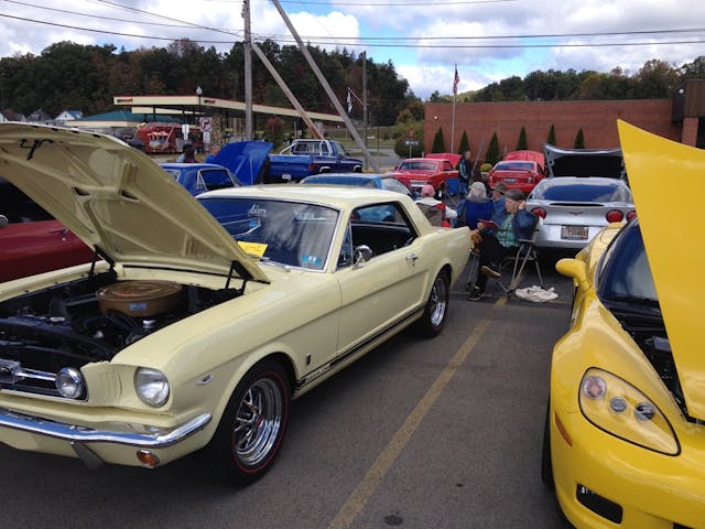 Larry Gross 1965 Ford Mustang GT hood up at show