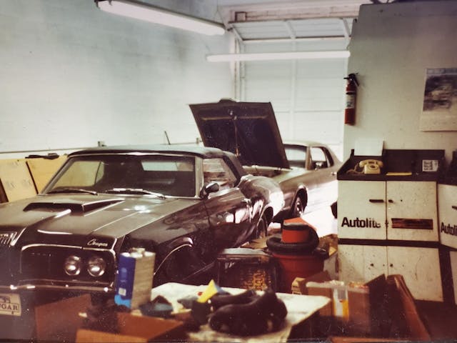 Mercury Cougars in garage