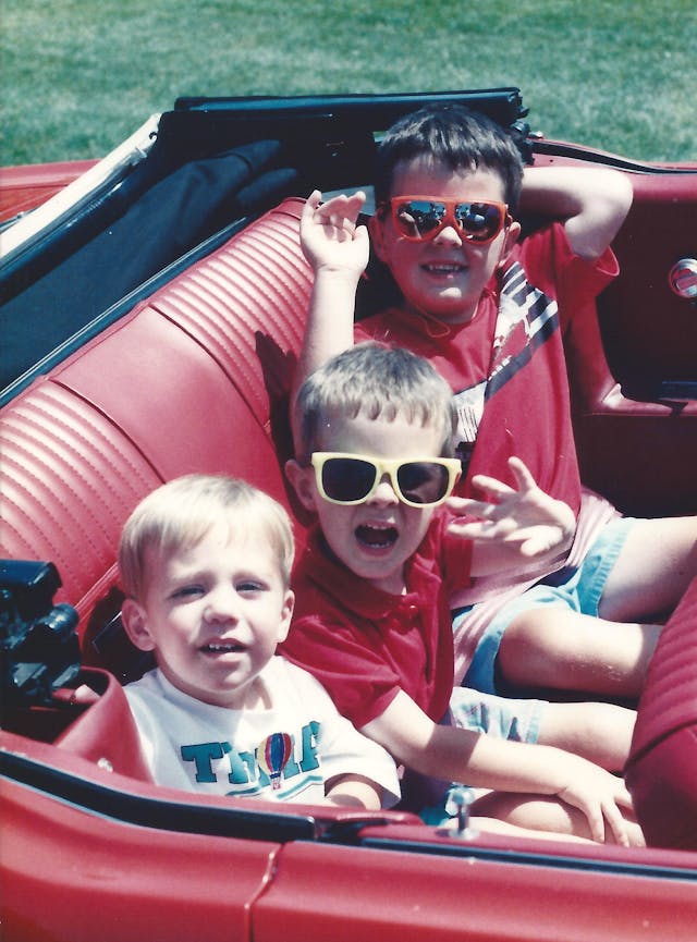 McCausland mustang boys in back seat