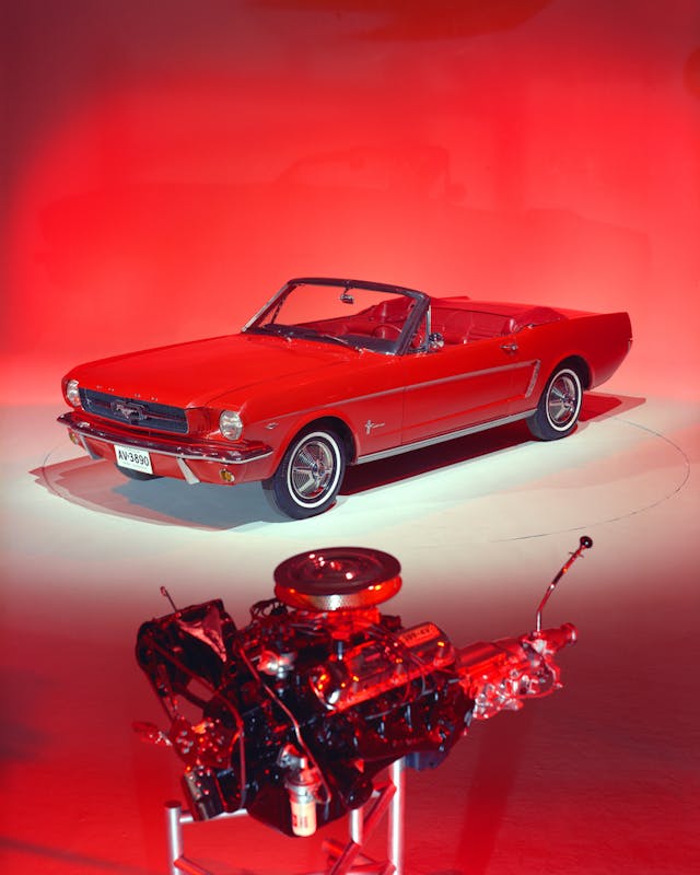 1965 Ford Mustang 289 hi-po engine on stand foreground