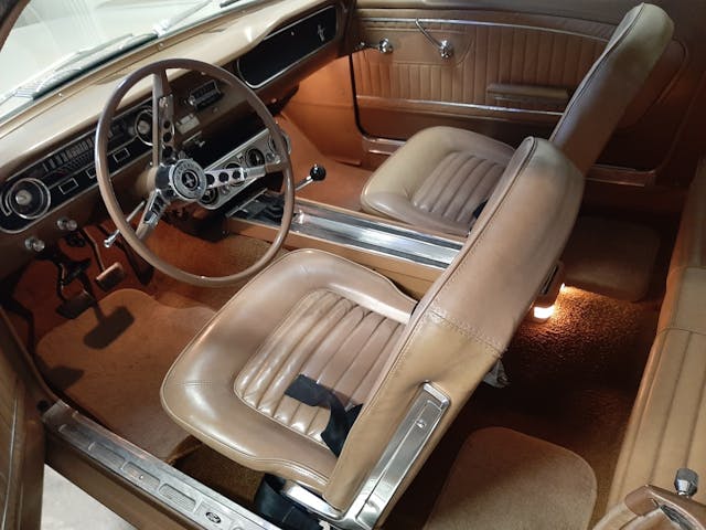 Rick Brough's 1964.5 Ford Mustang coupe front seats steering wheel shifter