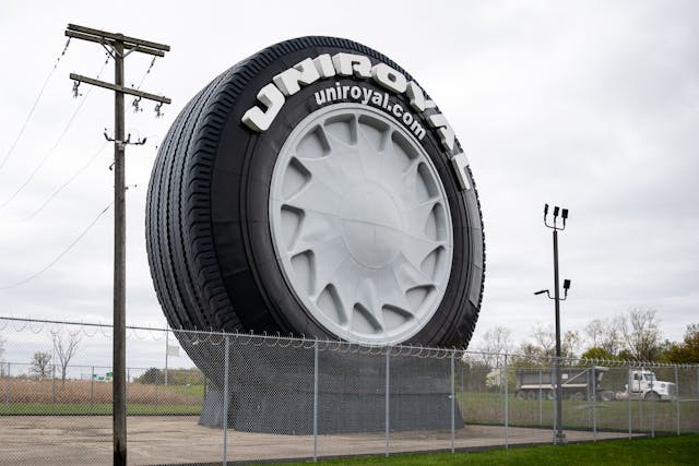 Uniroyal Tire Statue Detroit Michigan fence
