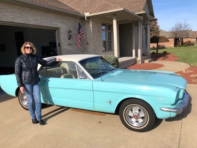 Whitmire wife Kathy with her 65 Mustang