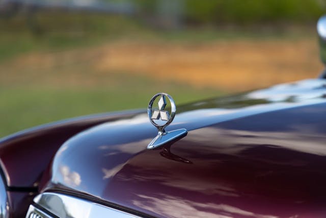 1998 Mitsubishi Pajero Jr. Flying Pug exterior tri-diamond badge detail